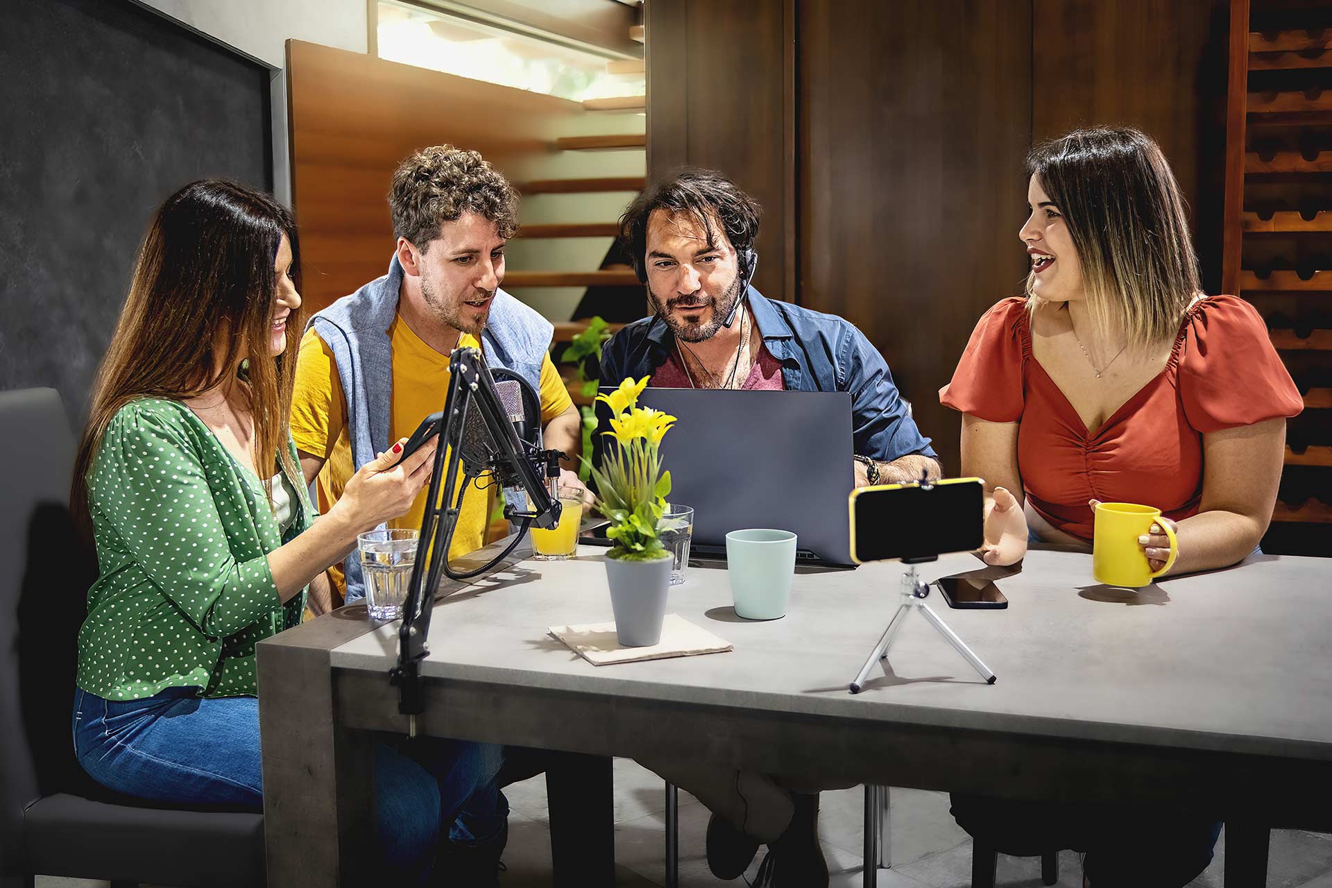 influencers-sitting-around-the-table-vlogging-2022-05-18-19-55-39-utc